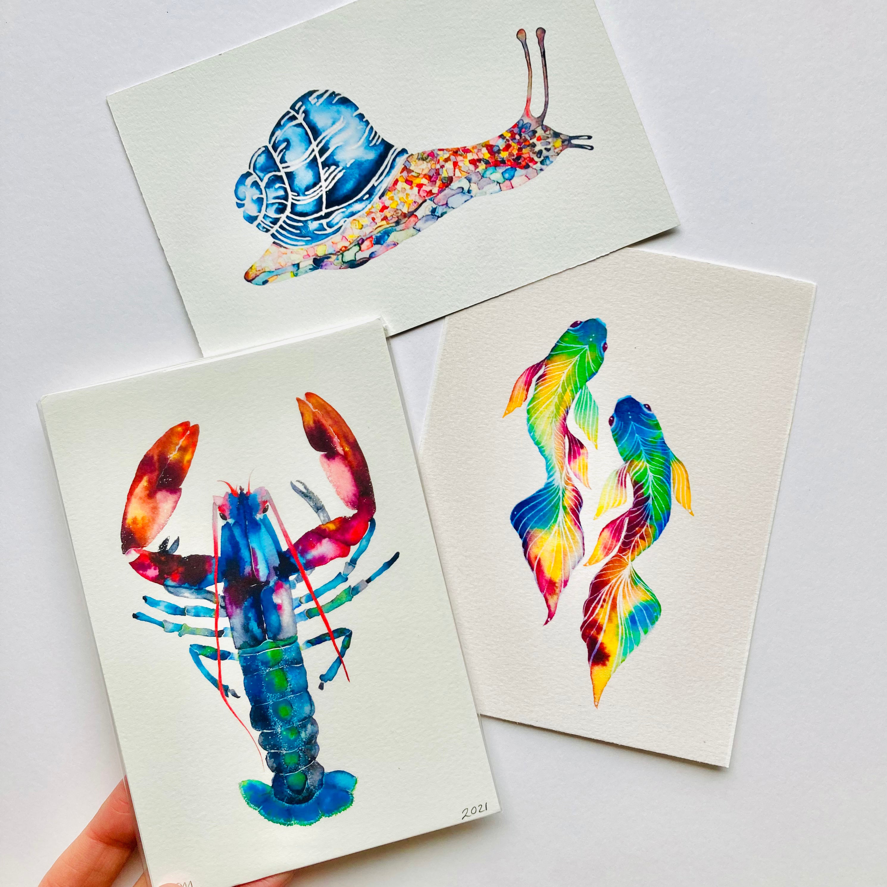 Miniature, brightly coloured lobster watercolour painting, pisces rainbow fish painting, abstract colourful watercolour snail painting